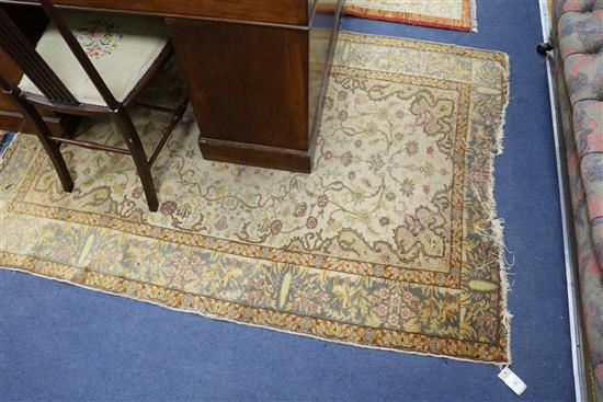 A Bokhara red ground rug and two Persian rugs (worn)